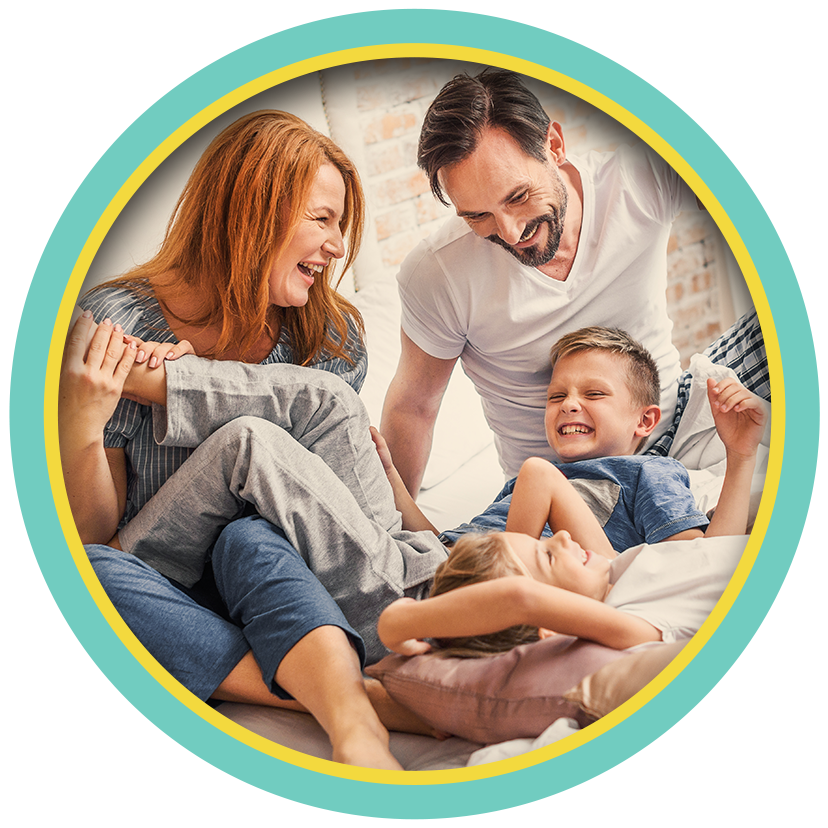 Smiling family playing together in a circular photo frame
